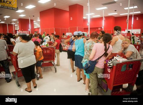 Shoppers on the check-out line at the new Target store in the East