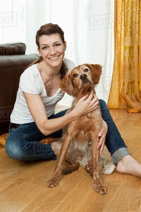 Young Woman With Dog Stock Photo Dissolve