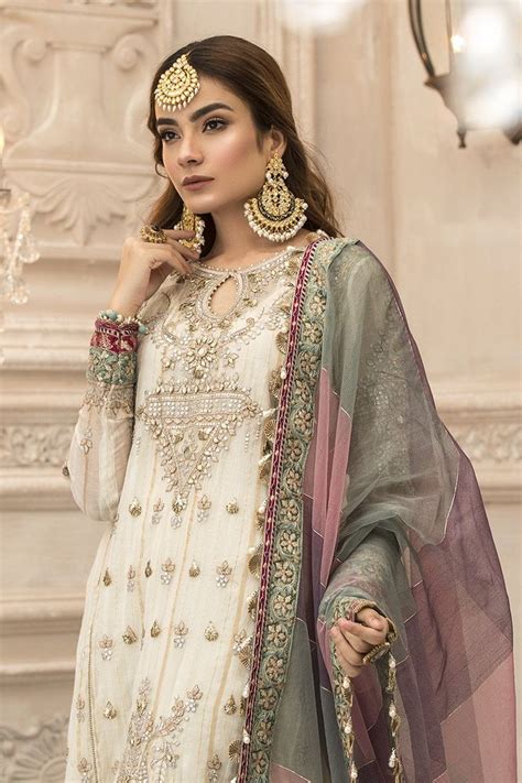 This year, eid will be marked on 12 or 13 may, depending on the sighting of the new moon. Best Eid Women Dresses Maria B Mbroidered Eid Collection ...