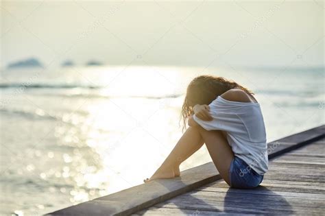 Sad Lonely Beautiful Woman On Pier — Stock Photo © Gladkov 119337158