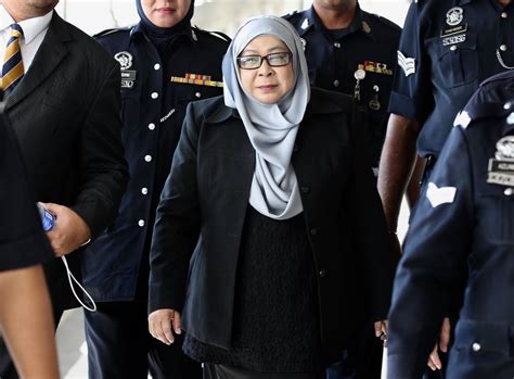 Hasanah who was clad in yellow suit arrived at the court complex at about 8.30am with her two bailors. Hasanah lepas kes pecah amanah AS$12.1 juta - Malaysia Today