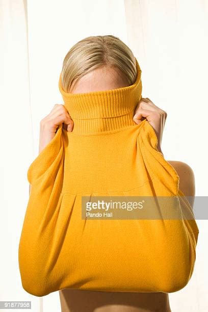 Removing Sweater Stock Fotos Und Bilder Getty Images