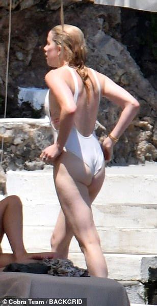 Amber Heard Takes A Refreshing Dip In The Sea During Sun Soaked Break