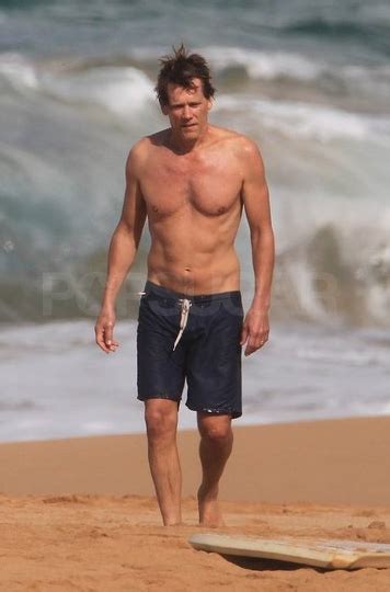 MEN S JOURNAL AND GORGEOUS HUNK S Kevin Bacon Wearing The Dark Swim Trunks