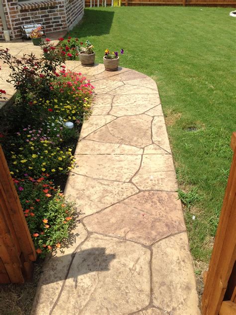 A helpful guide looking into stamped concrete walkway vs pavers. Stamped Concrete Walkway | Stamped concrete walkway ...