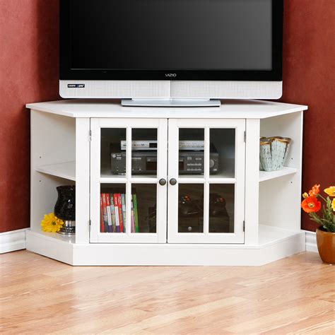 Corner tv stands are often triangular in shape and feature cutaway rear corners or tapered component shelving for an easy corner fit. Tall Corner TV Stand: Designs and Images - HomesFeed