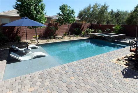 Custom Small Rectangular Pool With Raised Spa Tanning Ledge Loungers