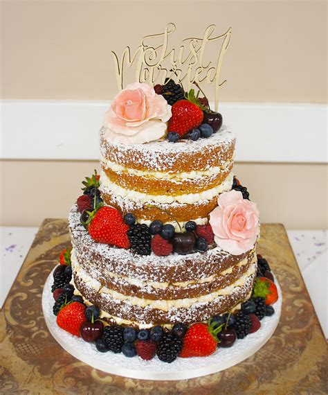 Two Tier Naked Wedding Cake With Toffee And Victoria Sponge Decorated