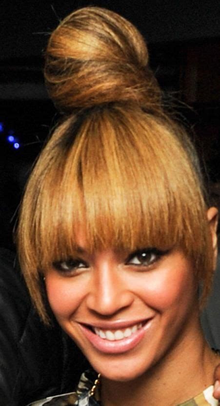 By shyam dodge for mailonline. beyonce bang and bun | Beyonce's voluminous top knot bun ...
