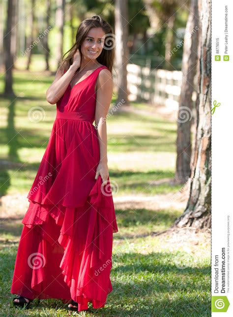 Woman In A Red Dress Outside Stock Image Image Of Black Sunny 88776515