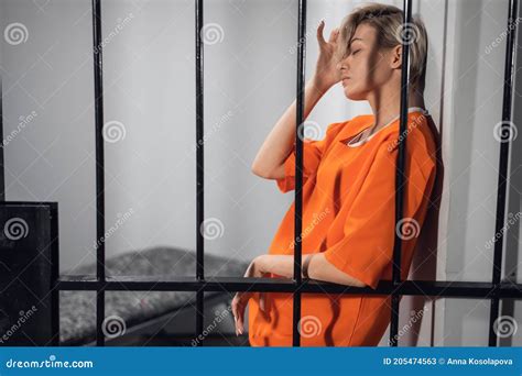 Young Beautiful Blonde Is Serving Time With A Women`s Prison In Solitary Confinement Stock Image