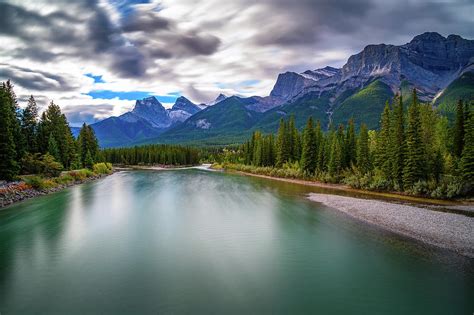 Bow River Near Canmore In Canada With Canadian Rockies Photograph By