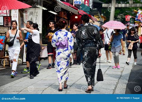 Japanese People Wear Traditional Japanese Clothing Kimono And Y