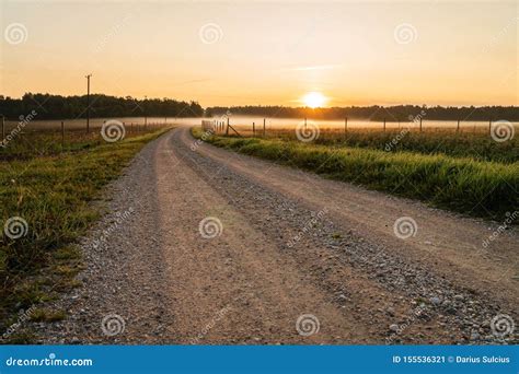 Dirt Road Leading To Fog And Sunrise During Sunrise Stock Image Image