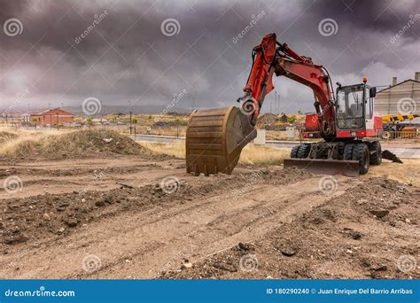 An Orange Bulldozer At A Construction Site Stock Photo Image Of Scoop