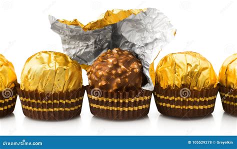 Candy In Gold Wrappers Isolated Stock Photo Image Of Background