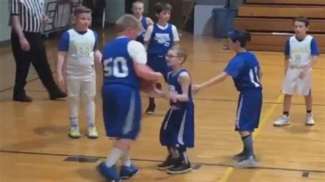 Young B Ball Player Shows Incredible Sportsmanship By Helping Teammate