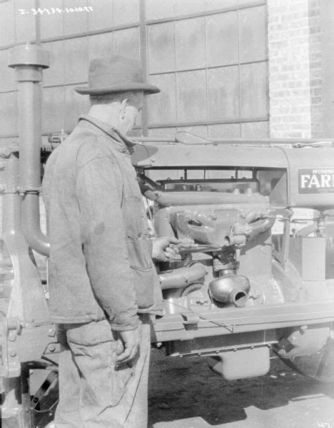 Man Repairing Farmall Tractor Engine Photograph Wisconsin