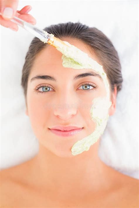 Beautiful Brunette Getting A Facial Treatment Stock Image Image Of Brunette Face 56818753