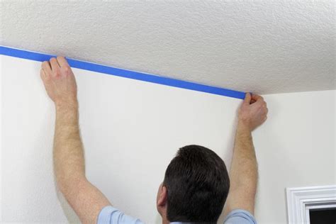 A paint roller extension pole will help you reach higher spots and angles more easily. How to Mask a Room Before Painting