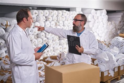 Warehouse Supervisor And Manager Men With Textile Stock Photo Image