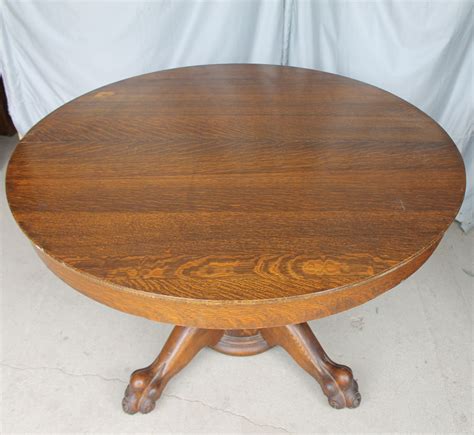 Bargain John's Antiques | Round Oak Table with claw feet ...