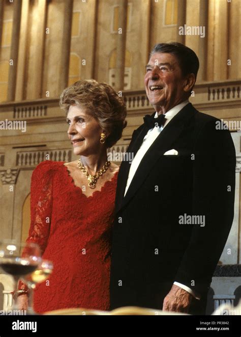 president ronald reagan and first lady nancy reagan at a dinner in washington where president