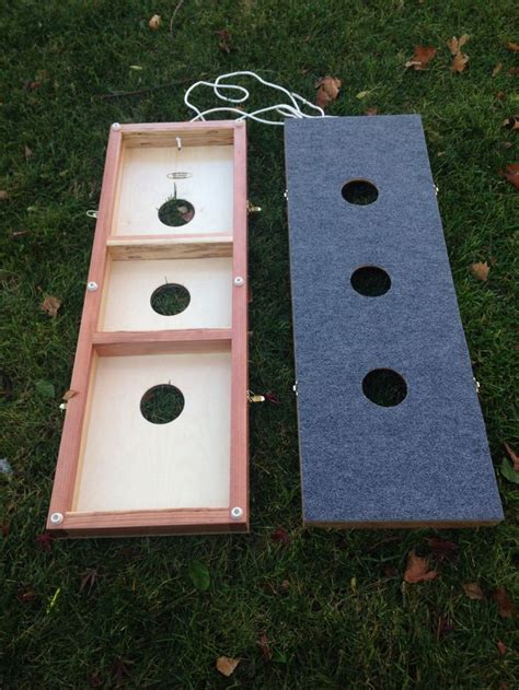 Washers is an outdoor game of skill, played by two or more contestants. Washer Board game // 3 hole washer toss // yard games ...