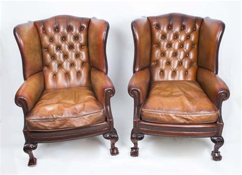 A Lush And Comfortable Pair Of Antique Chippendale Wingback Armchairs