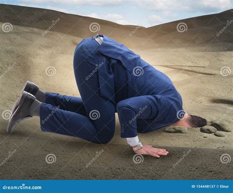 Businessman Hiding His Head In Sand Escaping From Problems Stock Image