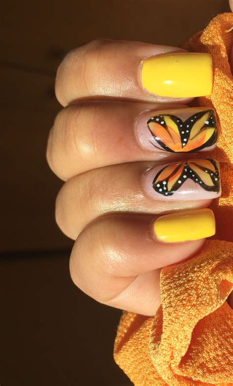 Blue and yellow butterfly nails. Yellow nails, butterfly nails, acrylics | Butterfly nail ...