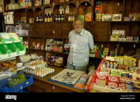Happy Shopkeeper Man Uk Hi Res Stock Photography And Images Alamy