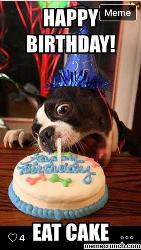 A Dog Is Blowing Out The Candles On A Birthday Cake That Says Happy