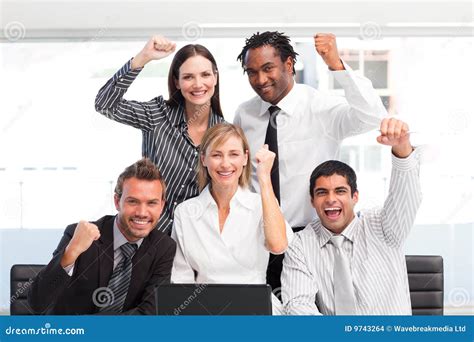 Business Team Celebrating A Success In Office Stock Photo Image Of