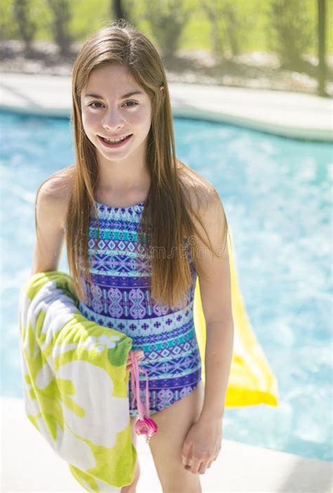 Teenage Girl Going Swimming In An Outdoor Pool During Summer Vaction Stock Image Image Of