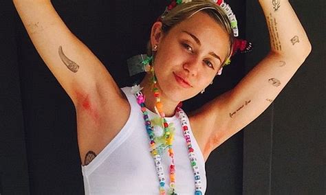 miley cyrus strips down to show off her bright pink arm pit hair on instagram daily mail online