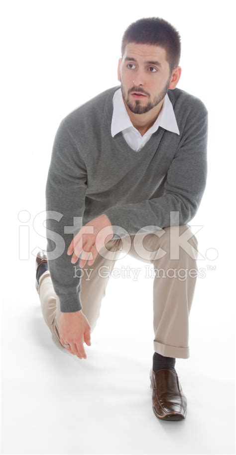 Male Kneeling Stock Photos