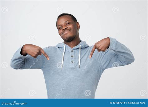 Young African American Man Looking Confident And Proud With Smile On