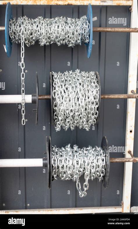 Three Rollers Of Chains On Display At The Hardware Store Rzeczyca