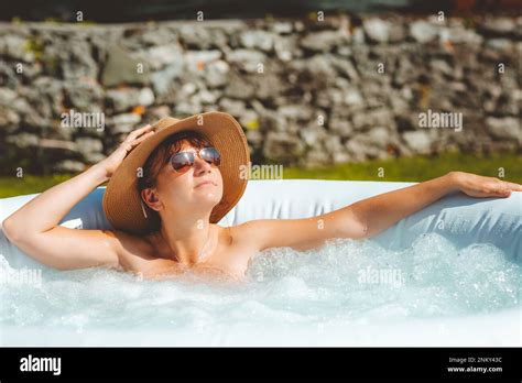 Woman Relaxing In The Hot Water Whirlpool Bathtub Concept Relaxing