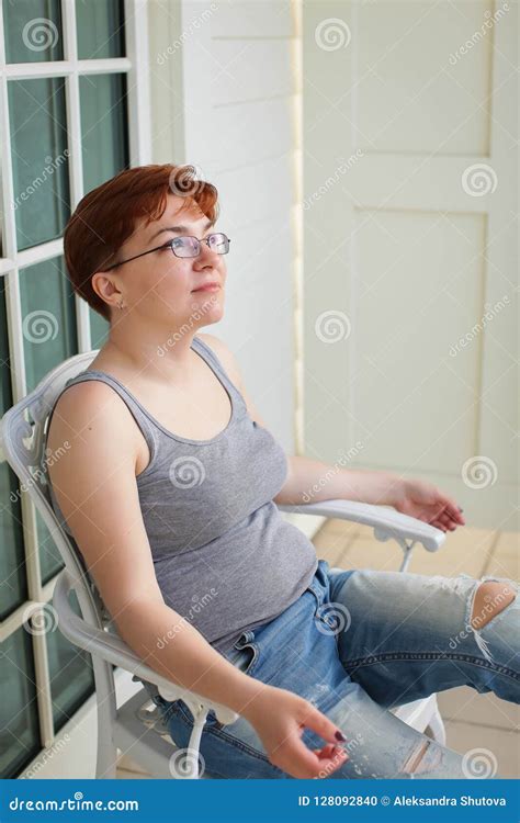 Home Lifestyle Caucasian Woman Relaxing On Chair On Outdoor Patio Living Room Tropical Vacation