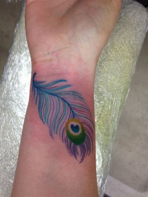 When you start interacting with your soulmate it starts getting more complex. Peacock Feather Tattoos Designs, Ideas and Meaning ...