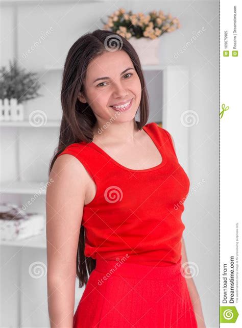 Woman Of The Brunette With Long Hair Smiles Stock Image Image Of Wall Camera 109675905