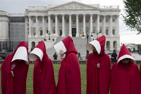 The book, set in new england in the near future, posits a christian fundamentalist theocratic regime in the former united states that arose as a response to a fertility crisis. Handmaid's Tale Costumes Used to Protest Health Care Bill ...
