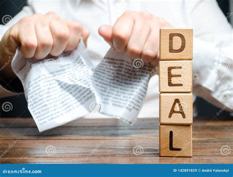 Word Deal and Businessman is Breaking a Contract in the Background