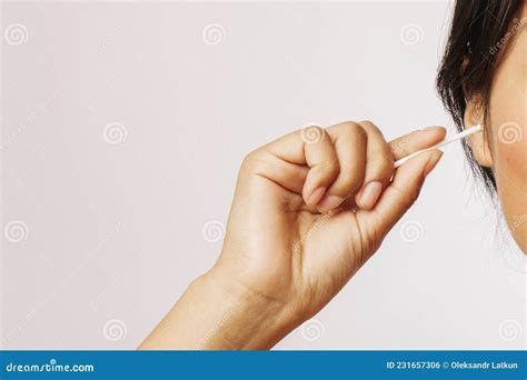 Woman Cleaning Her Ears With Cotton Swabs Stock Photo Image Of Close