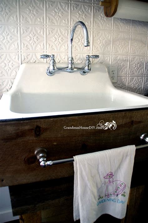 Once you have all your cabinets assembled, place the center cabinet first. How to build your own rustic kitchen sink base country diy