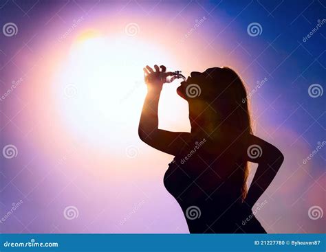 Woman Silhouette Drinking Water Stock Photo Image Of Pour Purple