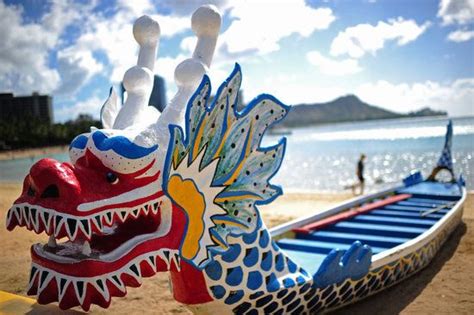 Looks Like A Dragon Boat On Waikiki Beach In Hawaii With Diamond Head