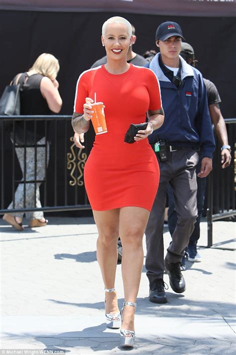 amber rose highlights her curves in a tight mini dress to promote her tv show daily mail online